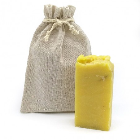 Jabón natural con extracto de ruda presentado en bolsa de yute